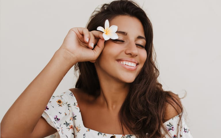 Woman with a bright smile that she loves